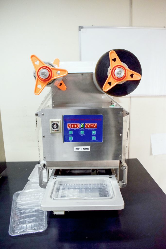 Table Top Sealer For MultiFunction Trays FAS Development Corporation